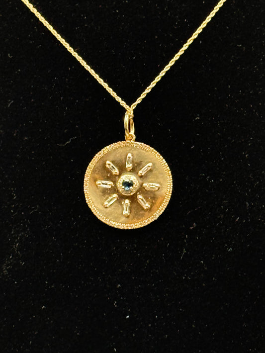 Radiant Starburst Pendant – 14k Yellow Gold with Blue Sapphire & White Diamonds