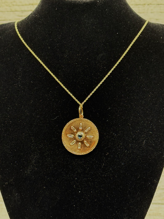 Radiant Starburst Pendant – 14k Yellow Gold with Blue Sapphire & White Diamonds